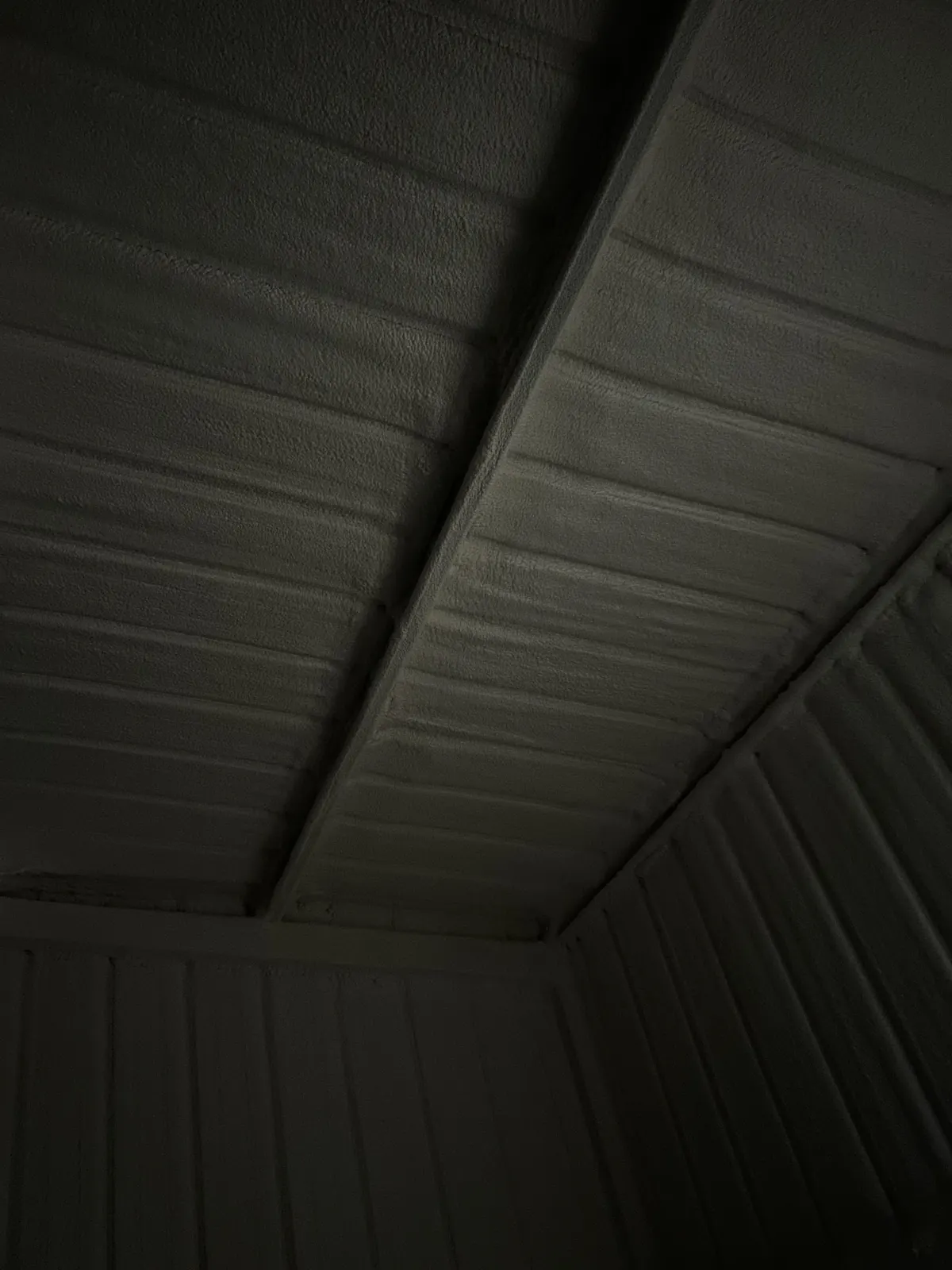 Premium Spray Foam coated insulation on metal building ceiling in McAllen, TX