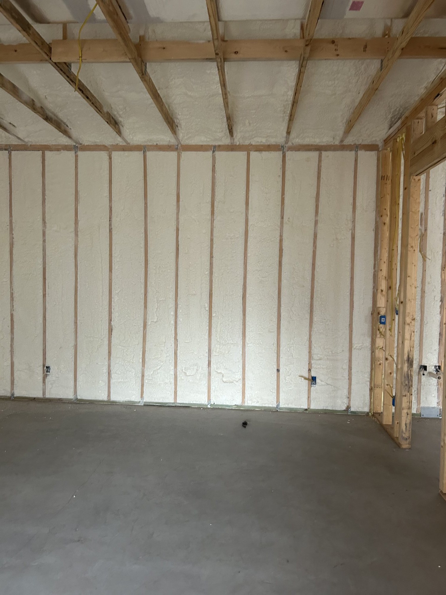Premium Spray Foam metal building roof deck insulation in McAllen, TX